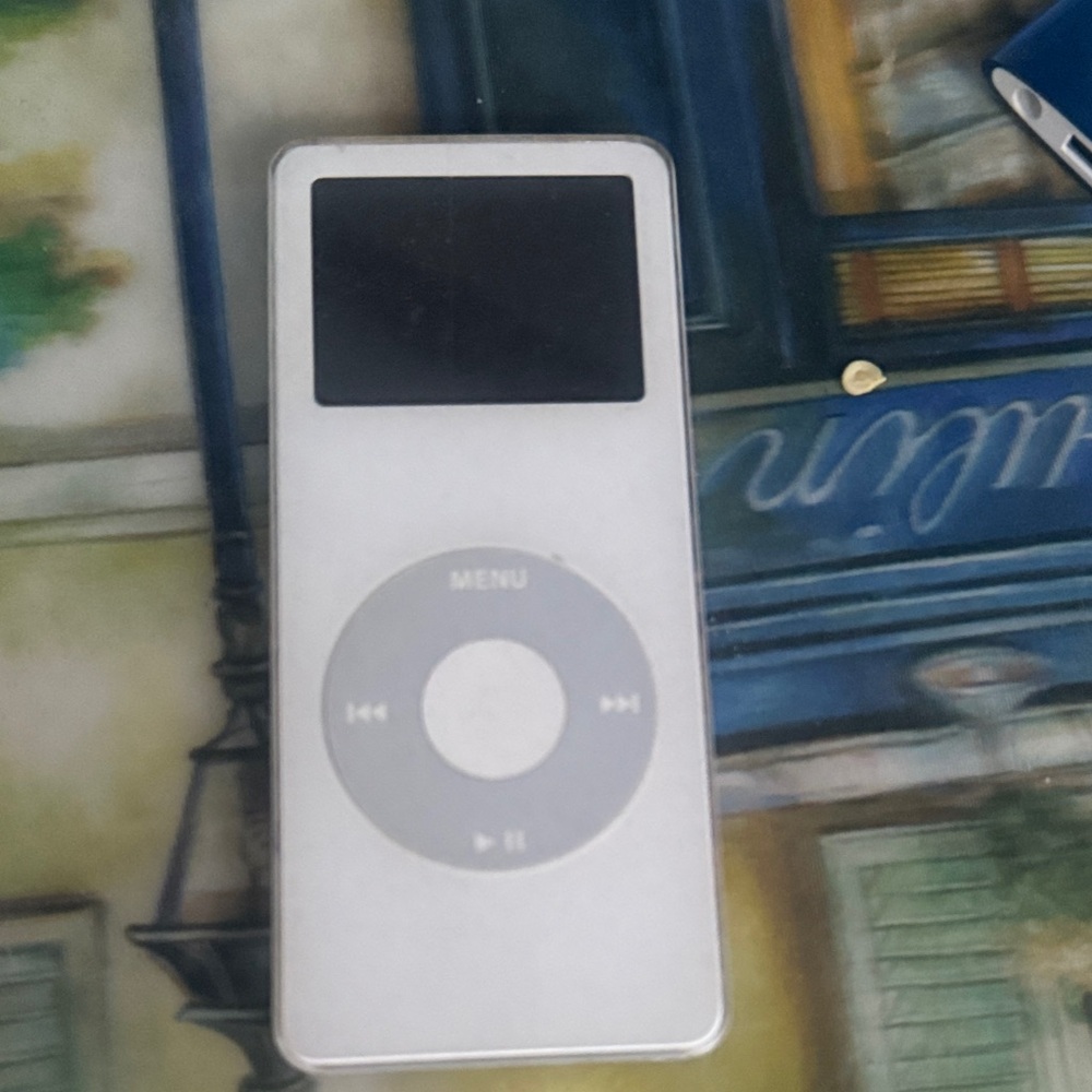 Compact Silver MP3 Player I pod